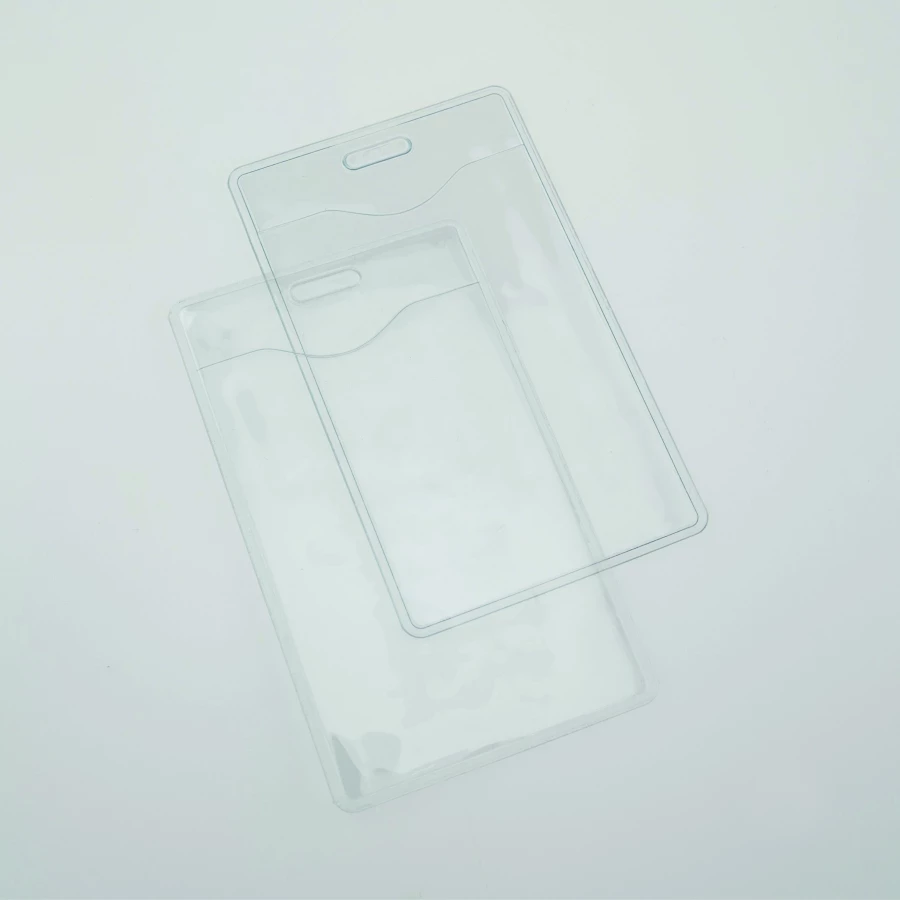 Plastmasas nozīmītes uzmava 62x87mm, vertikāla